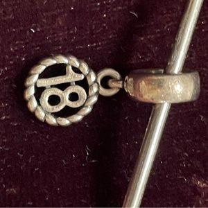 Retired Pandora charm “18” birthday sterling